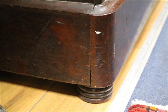 A 19th century French marble topped mahogany commode W.135cm